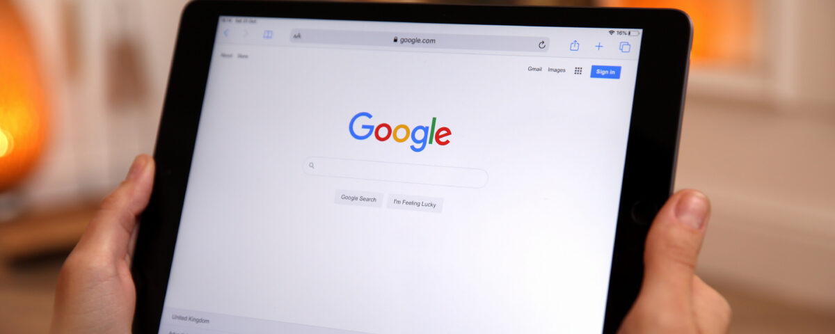 Google search homepage displayed on a tablet showing website search visibility