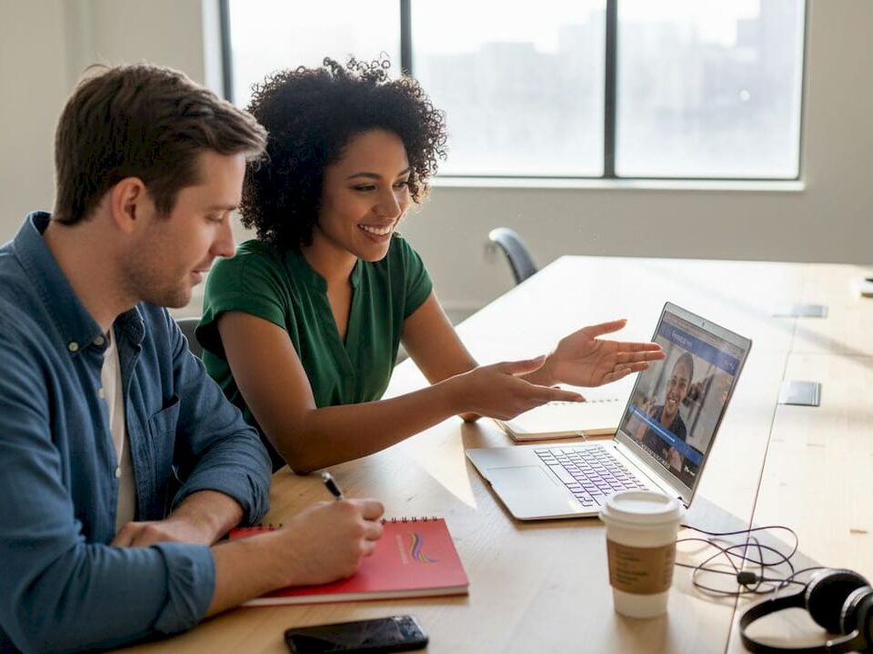Marketing team reviewing video project footage