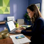 Small business owner working on CRM software