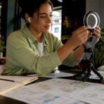 Content creator preparing smartphone for reels filming
