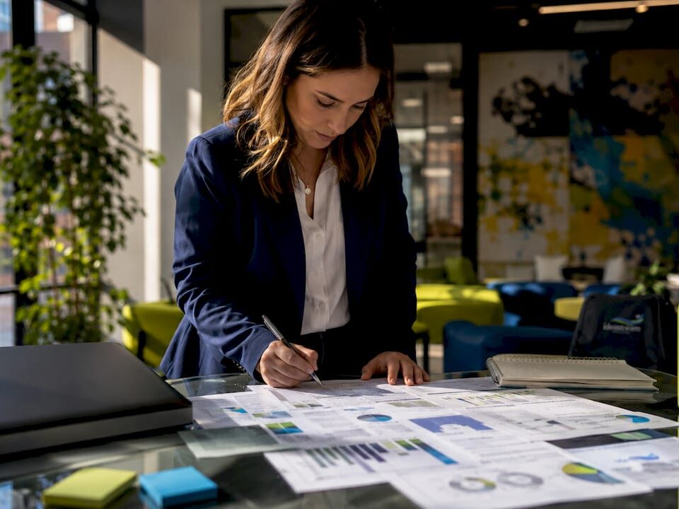 Healthcare marketer reviewing patient acquisition reports