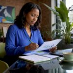 Businesswoman reviewing growth marketing charts
