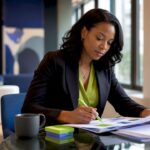 Marketing manager reviewing branding strategy papers