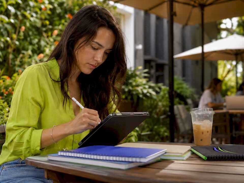 Social media manager planning workflow at coworking space