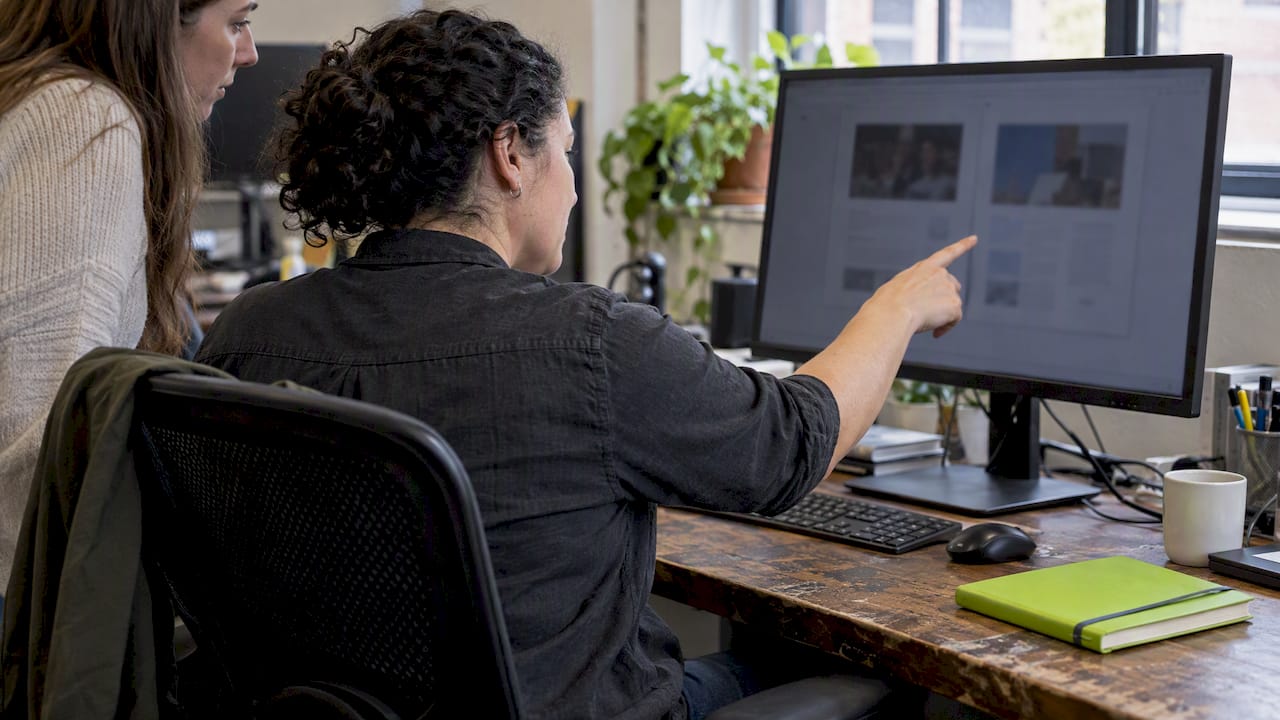 Strategist comparing PPC landing page versions